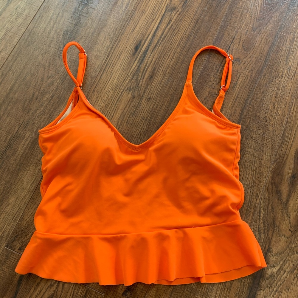 Kortni Jeane orange scoop